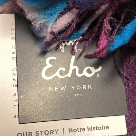 Echo New York knitted hat with pompom and trim.